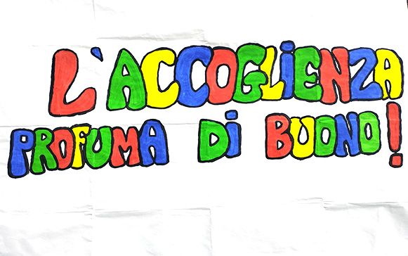 Scritta l'accoglienza profuma di buono
